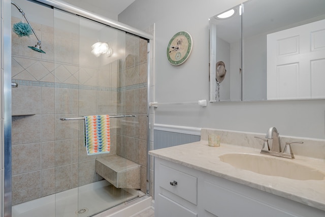 bathroom featuring vanity and walk in shower