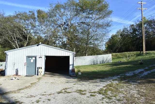 garage with a yard