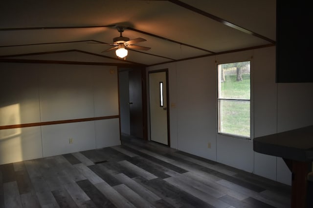 empty room featuring hardwood / wood-style floors, ceiling fan, and lofted ceiling