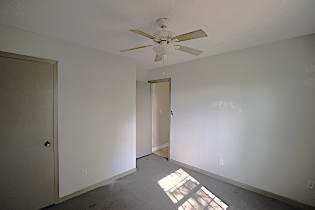 unfurnished bedroom featuring ceiling fan and light colored carpet