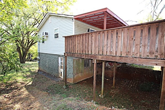 view of home's exterior with a deck