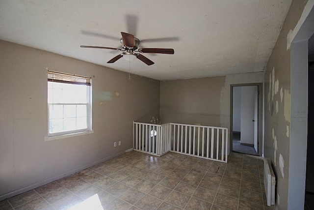 empty room with ceiling fan