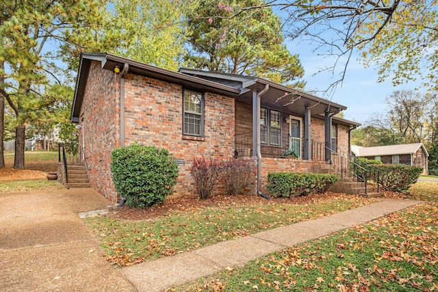 view of home's exterior featuring a porch