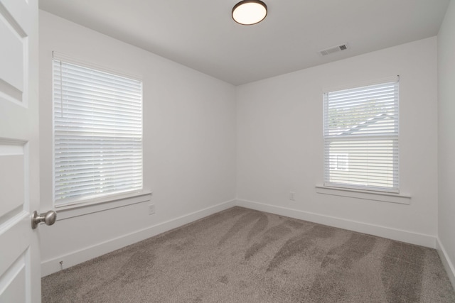 spare room with carpet flooring