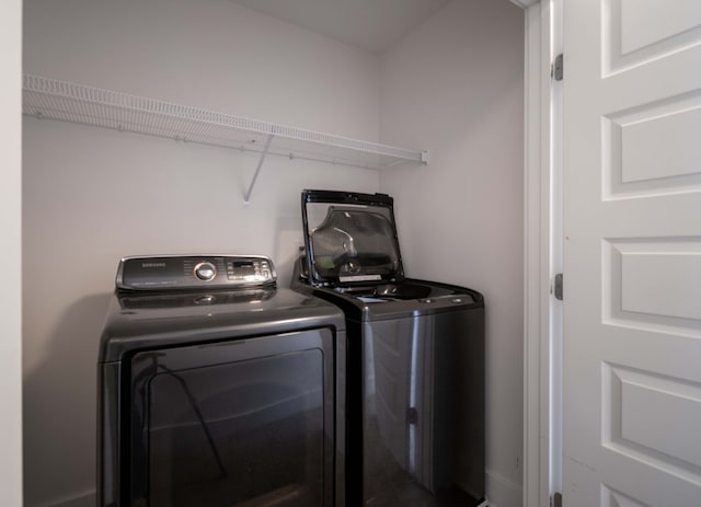 laundry room featuring independent washer and dryer