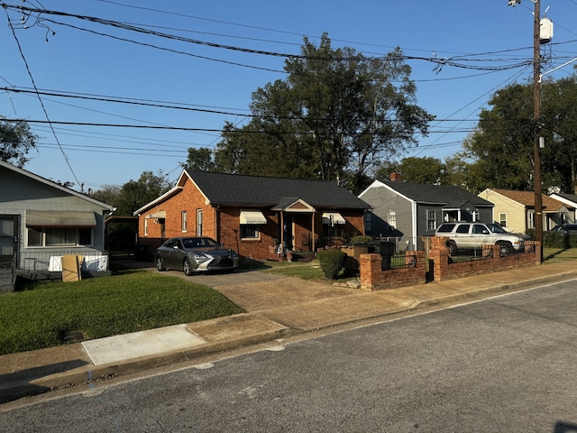 view of front facade with a front lawn