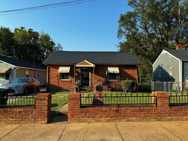 view of front facade with a front lawn