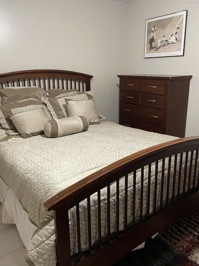 bedroom featuring tile patterned floors