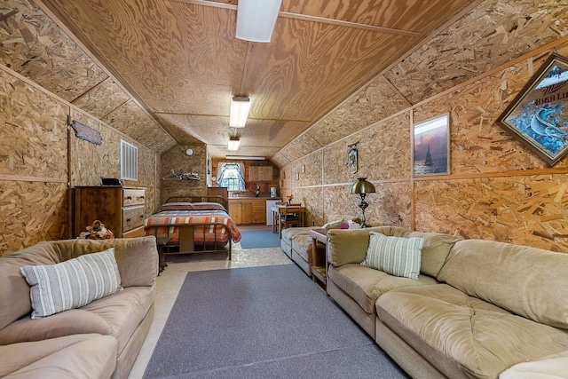 bedroom with lofted ceiling and wooden ceiling