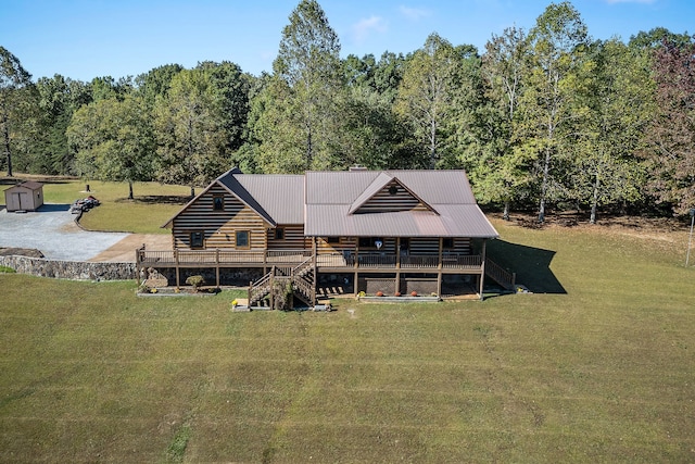 back of house featuring a yard