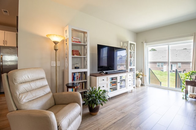 living room featuring light hardwood / wood-style floors