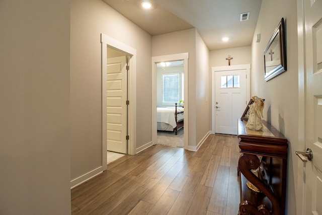 doorway to outside featuring light hardwood / wood-style floors