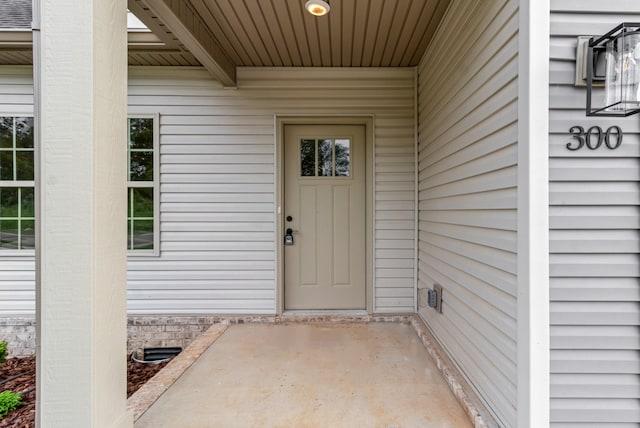 entrance to property with a patio area