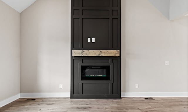 interior details with hardwood / wood-style flooring