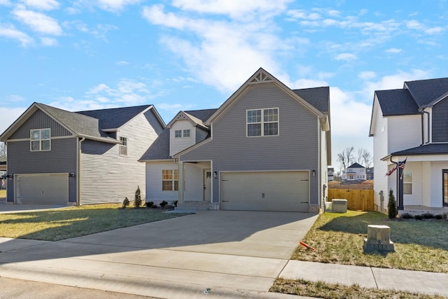 view of property featuring cooling unit, a garage, and a front yard