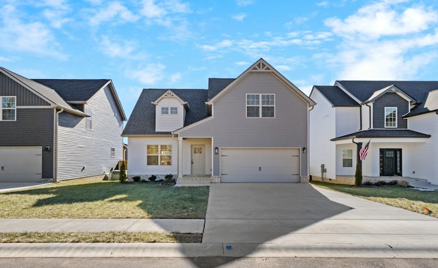 view of front of property featuring a garage and a front yard