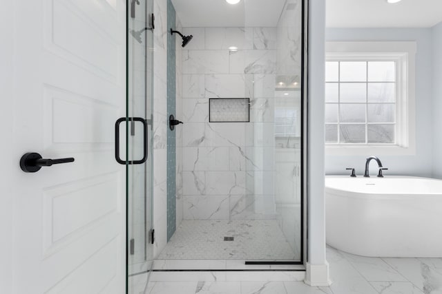 bathroom with independent shower and bath