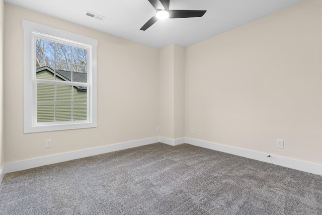 carpeted empty room with ceiling fan