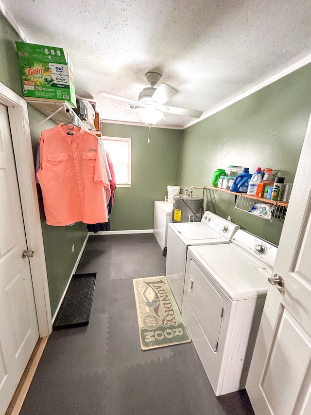 laundry room featuring ceiling fan, separate washer and dryer, a textured ceiling, and crown molding