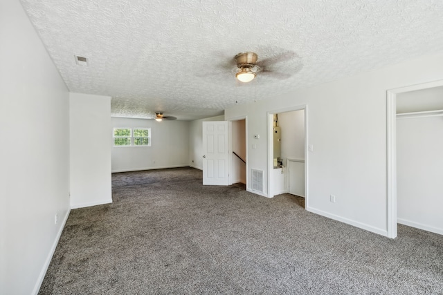 unfurnished bedroom featuring a textured ceiling, ceiling fan, and carpet flooring