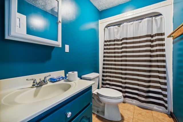 bathroom with a textured ceiling, a shower with shower curtain, vanity, and toilet