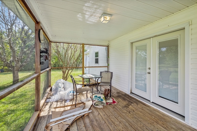 sunroom / solarium with plenty of natural light and french doors