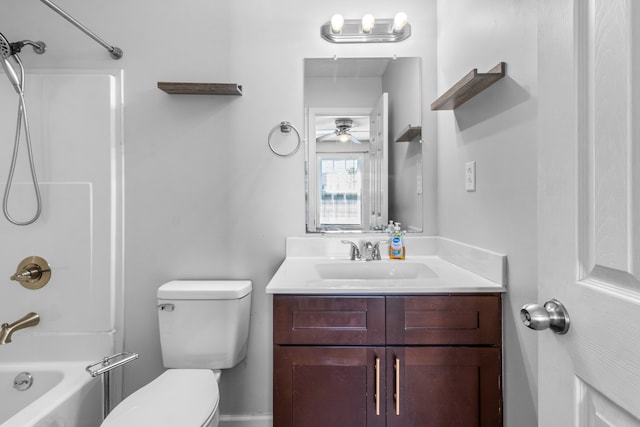 full bathroom featuring ceiling fan, shower / tub combination, vanity, and toilet