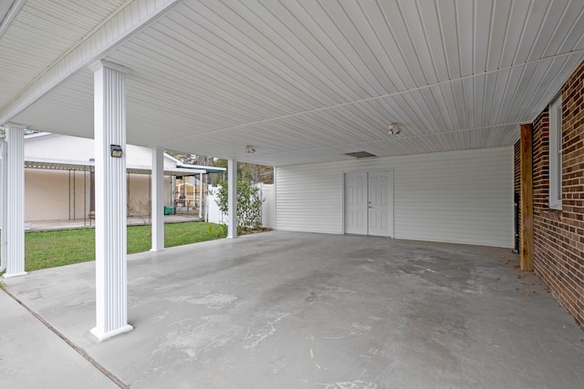 view of patio / terrace featuring a carport