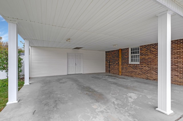 view of patio featuring a carport