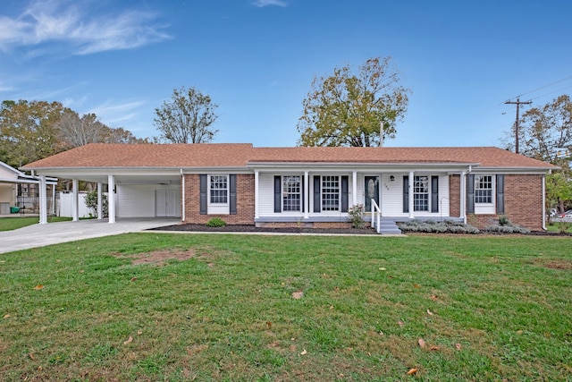 single story home featuring a front lawn, a porch, and a carport