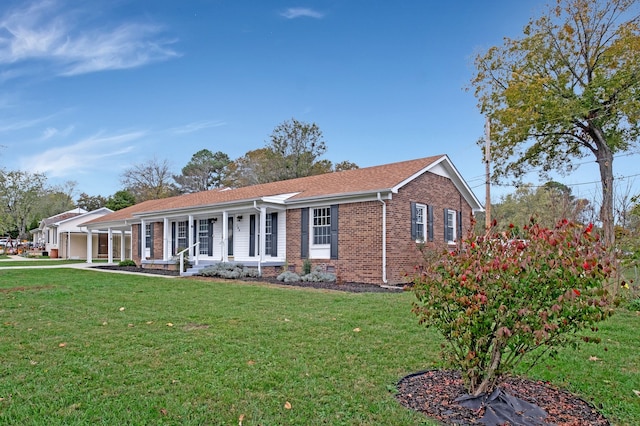 single story home with a front lawn and a porch