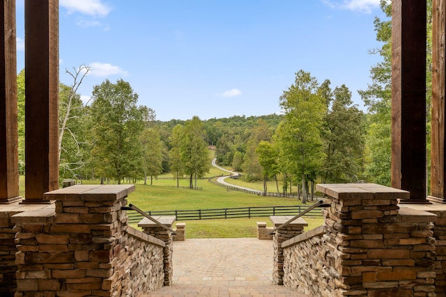 surrounding community featuring a patio area and a playground