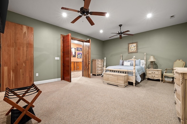 carpeted bedroom featuring ceiling fan