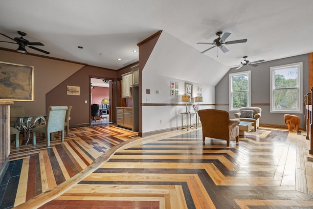 living area featuring parquet flooring, vaulted ceiling, and ceiling fan