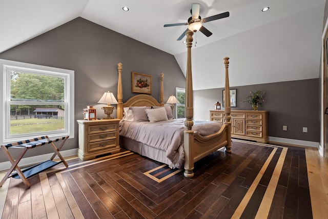 bedroom with dark hardwood / wood-style flooring, lofted ceiling, and ceiling fan