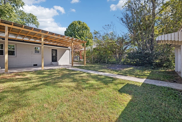 view of yard with a patio and a pergola