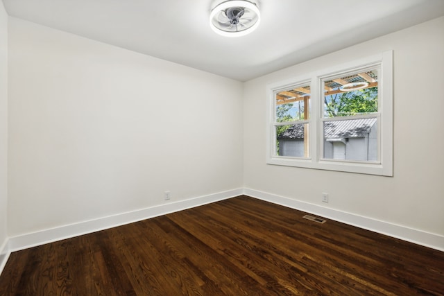 empty room featuring hardwood / wood-style flooring