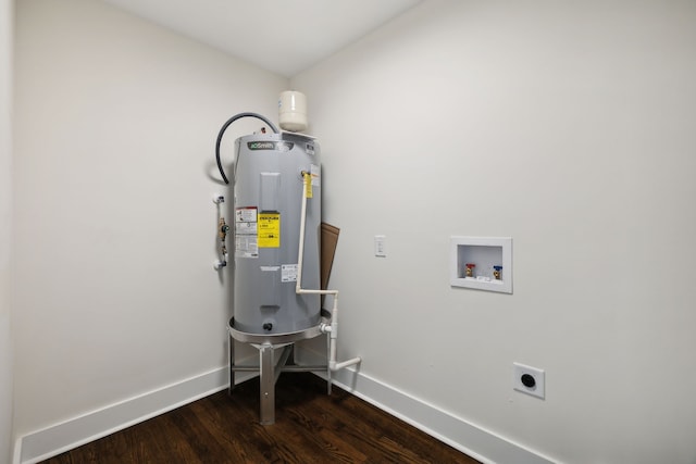 utility room featuring water heater