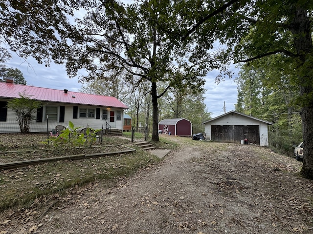 exterior space with a storage shed