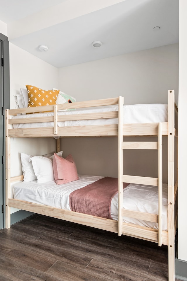 bedroom with wood-type flooring