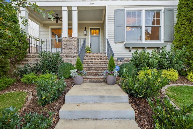 property entrance with covered porch