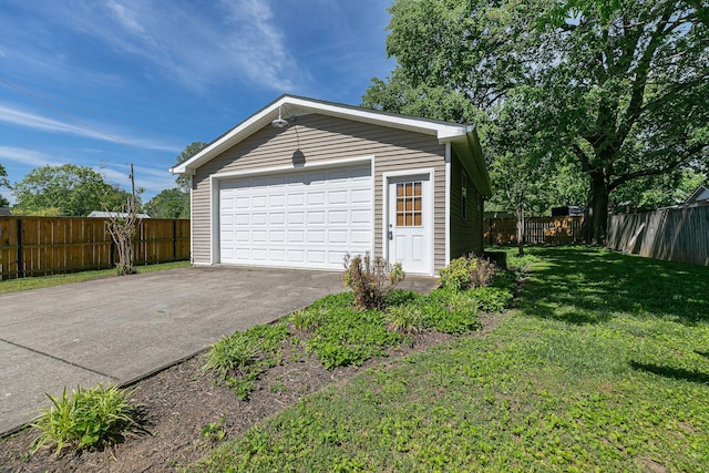 garage with a lawn