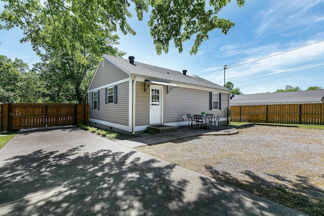 back of property featuring a patio area