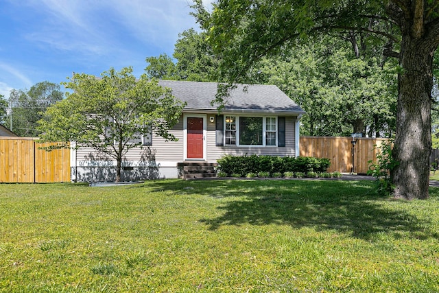 ranch-style house featuring a front yard