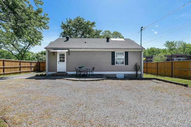 rear view of house featuring a patio