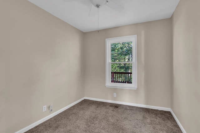 empty room featuring carpet flooring