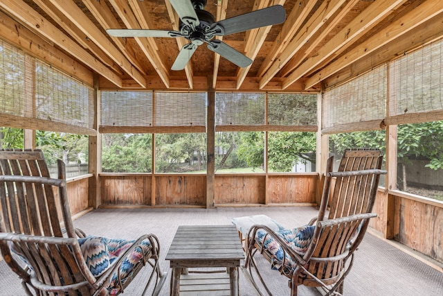 sunroom featuring ceiling fan