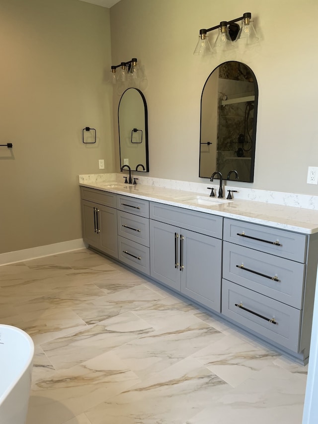 bathroom with vanity and shower with separate bathtub