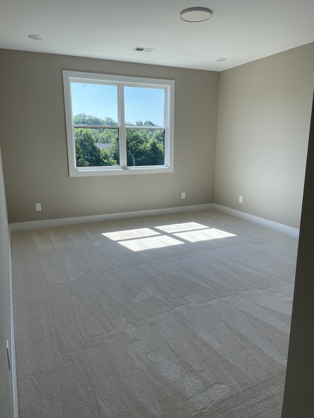 view of carpeted spare room