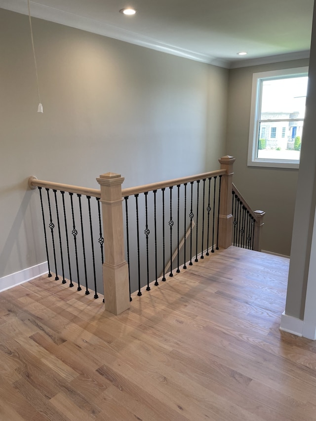 staircase with hardwood / wood-style flooring